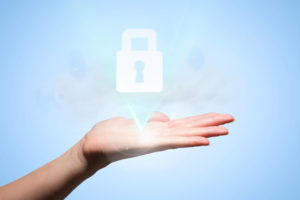 hand against blue background with a padlock graphic