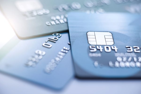 stack of banking cards with chip visible